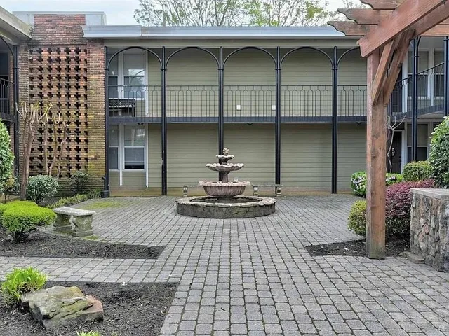 a view of a house with a sink and a window