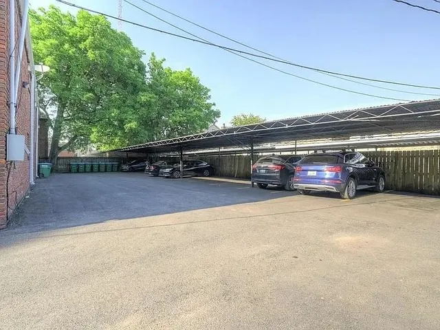 a car parked in front of a house