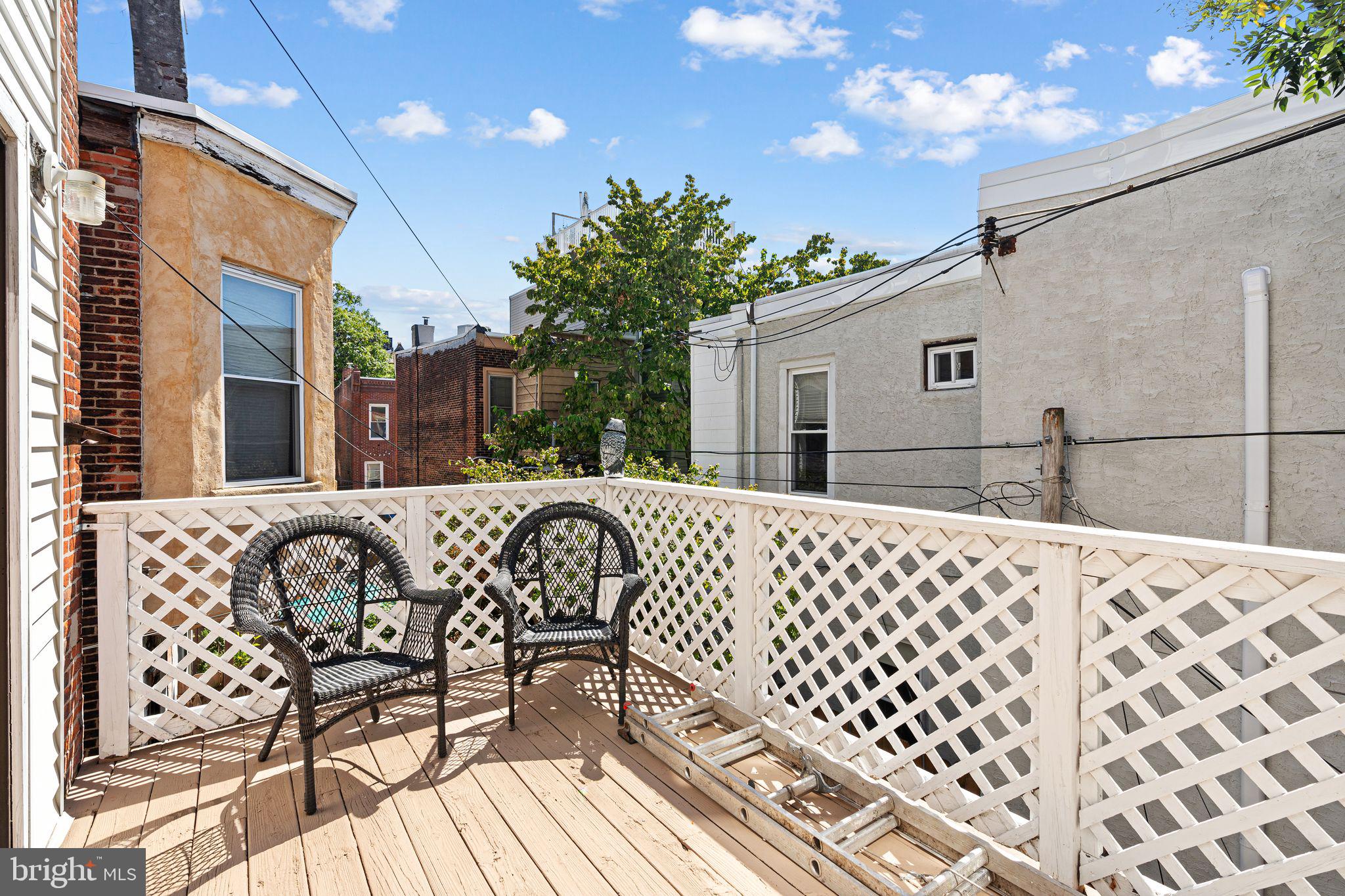 2324 Poplar Street, Unit 2F Philadelphia, PA 19130 - Photo 10 of 17 a view of a patio with a table and chairs