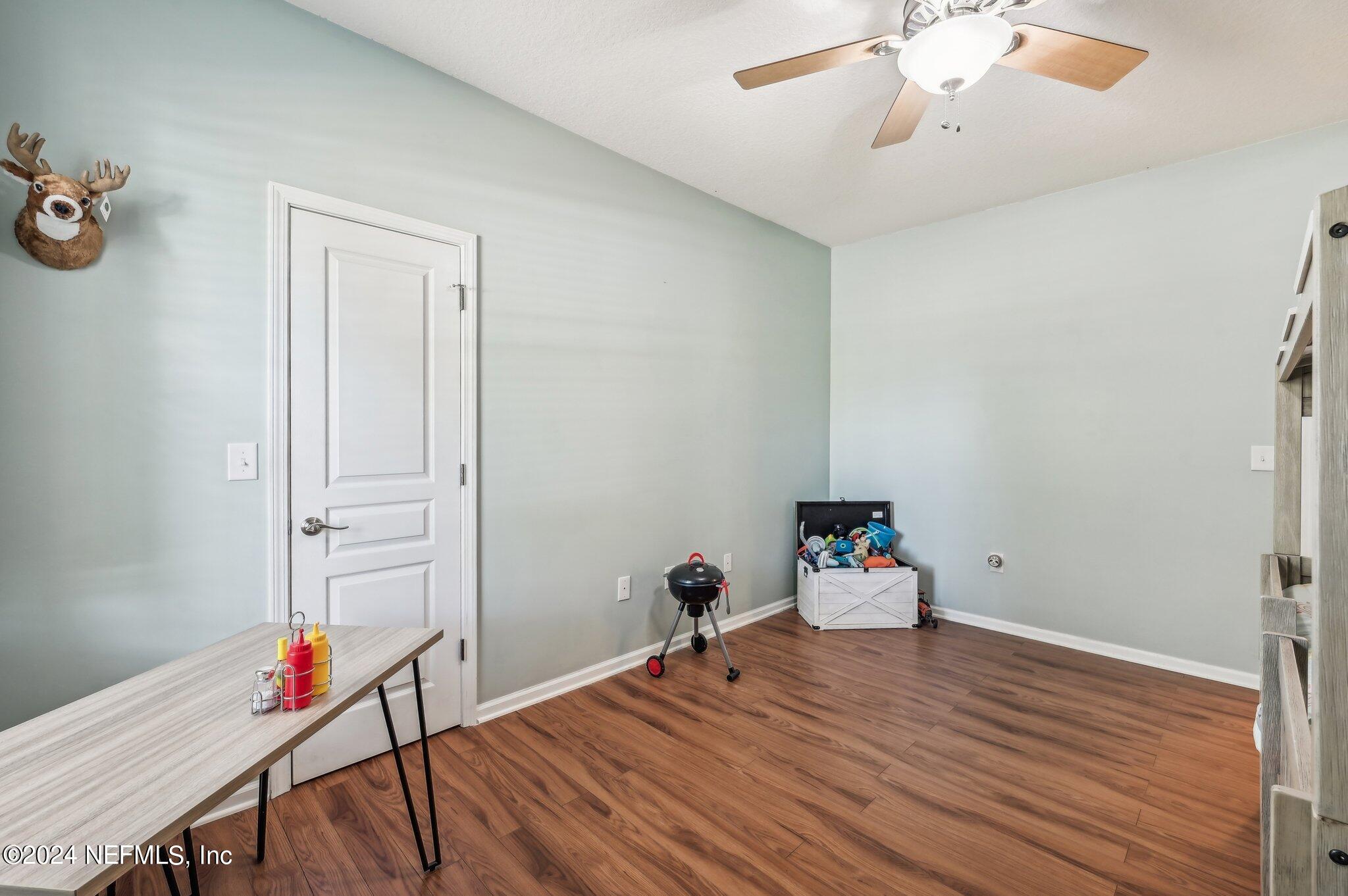 4253 Dalry Drive Jacksonville, FL 32246 - Photo 20 of 40 a workspace with wooden floor