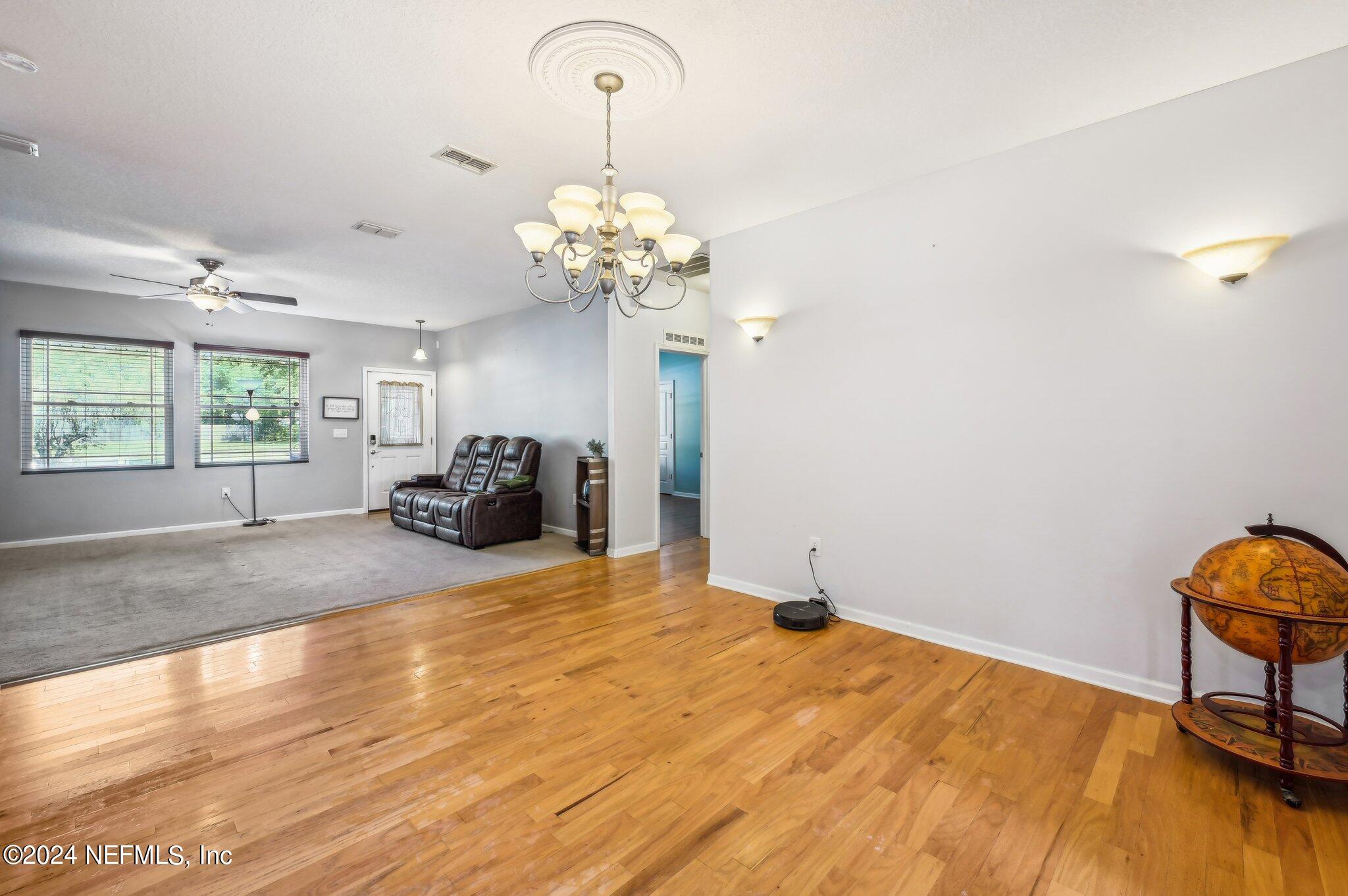 4253 Dalry Drive Jacksonville, FL 32246 - Photo 26 of 40 a bedroom with a bed dresser and a window