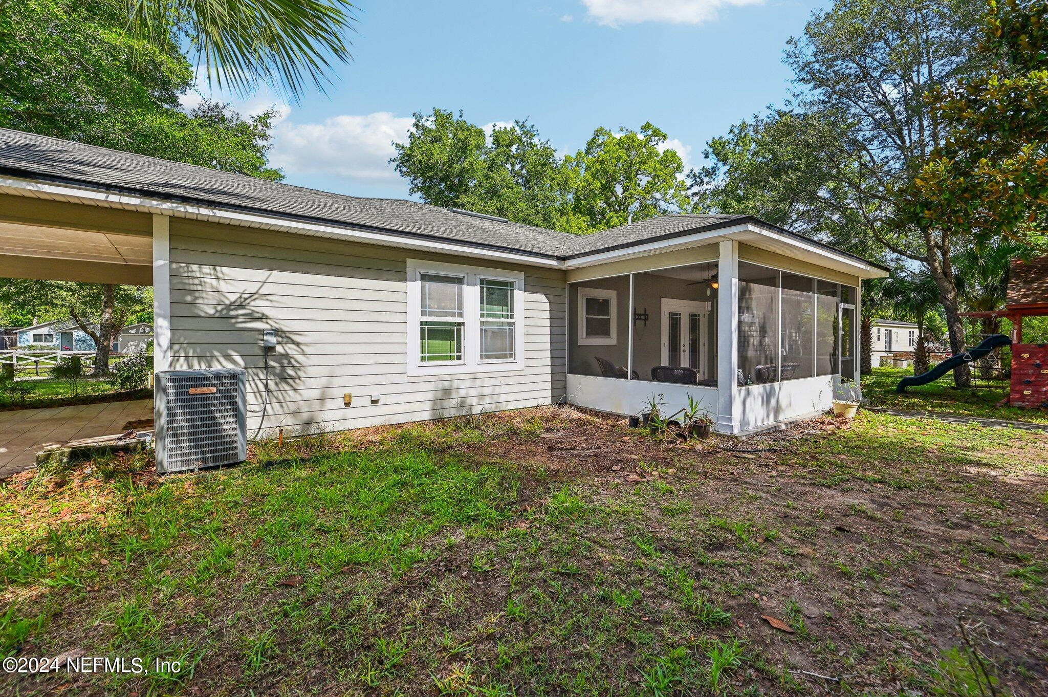 4253 Dalry Drive Jacksonville, FL 32246 - Photo 31 of 40 front view of a house with a yard