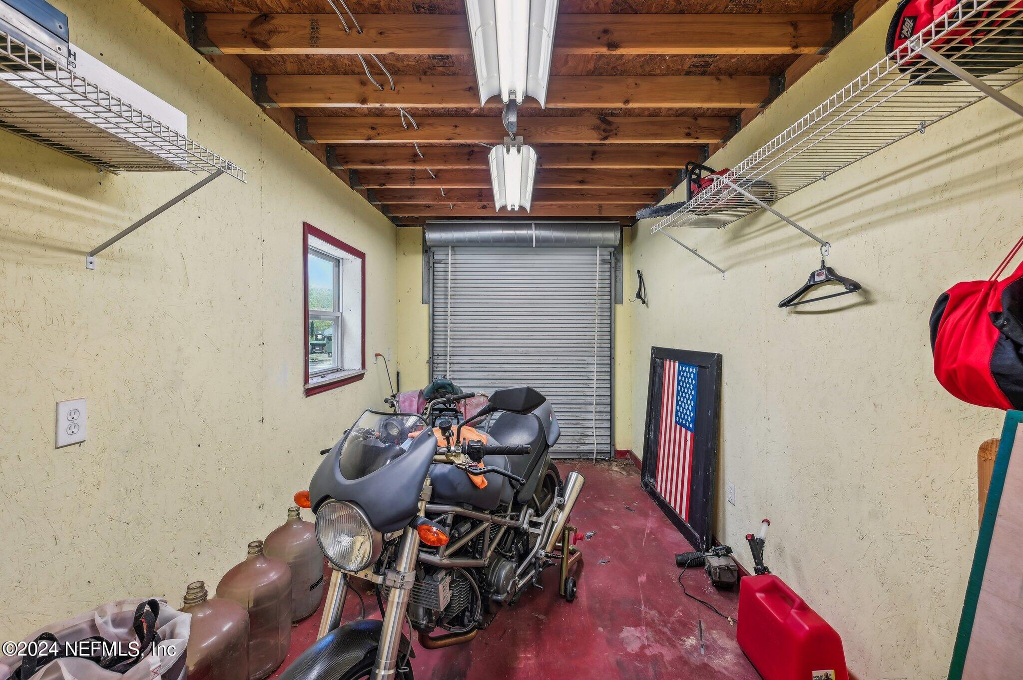 4253 Dalry Drive Jacksonville, FL 32246 - Photo 34 of 40 a view of a room with gym equipment