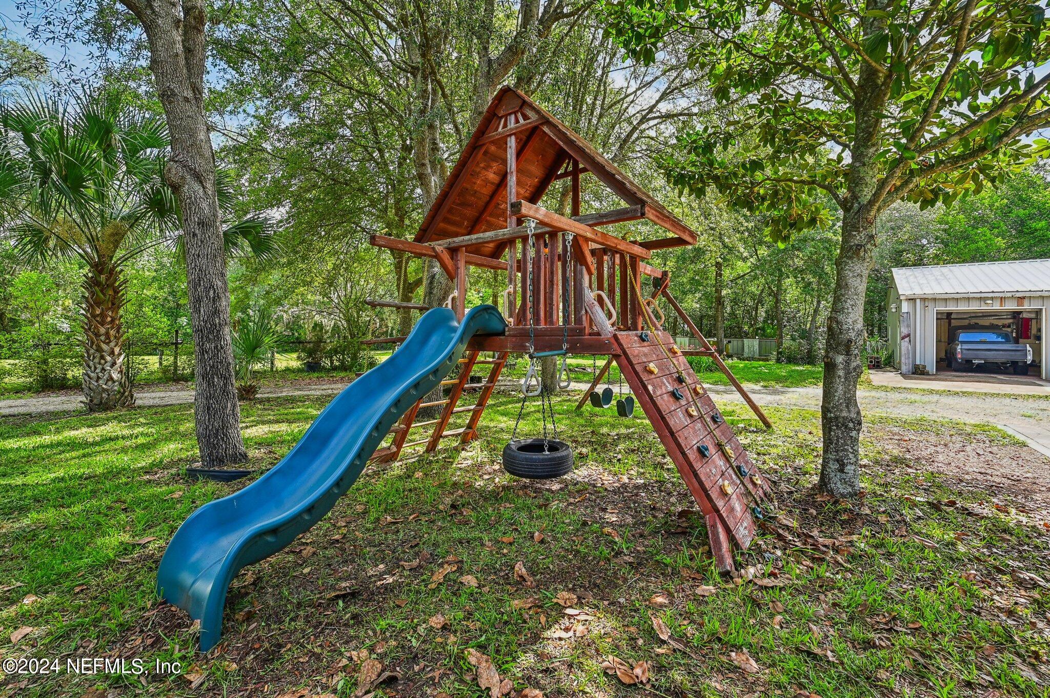 4253 Dalry Drive Jacksonville, FL 32246 - Photo 37 of 40 a view of a house with a park