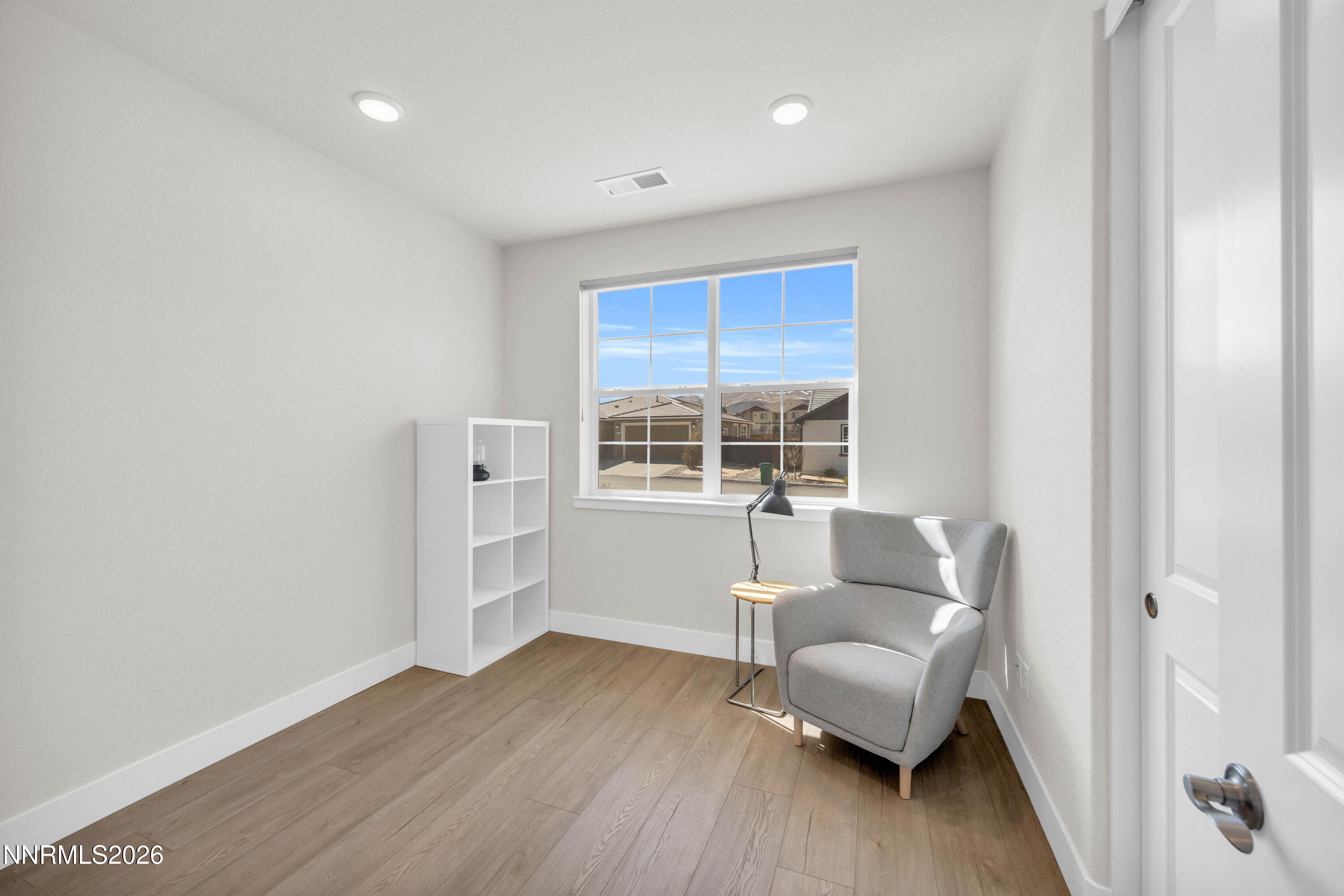 7774 Enclave Key Road Reno, NV 89506 - Photo 17 of 26 a living room with furniture and a large window