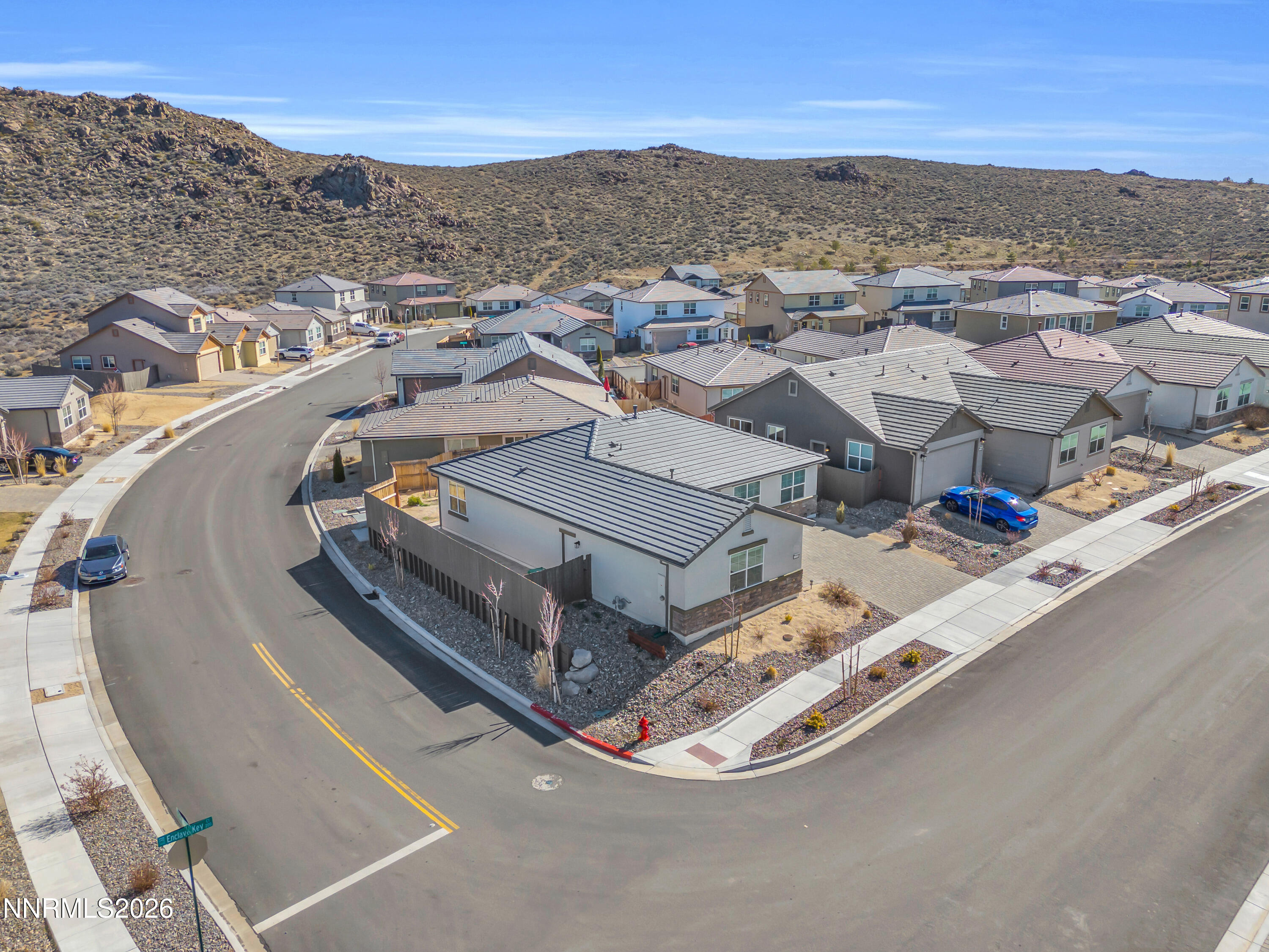 7774 Enclave Key Road Reno, NV 89506 - Photo 25 of 26 an aerial view of residential houses with outdoor space