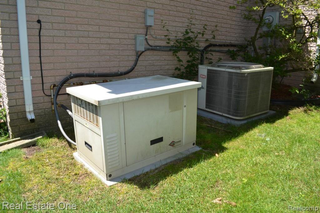 419 Lake Forest Road Rochester, MI 48309 - Photo 81 of 99 Whole House Gas Powered Back-up Generator & A/C Condenser
