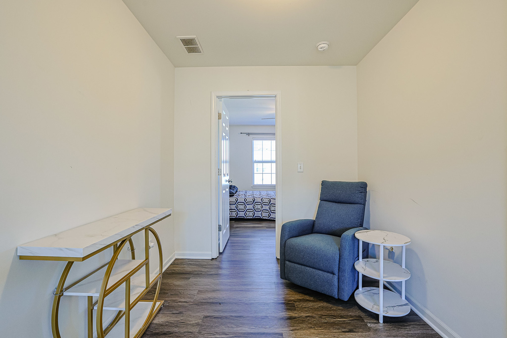 299 Bennett Drive Carol Stream, IL 60188 - Photo 13 of 27 a room with furniture and wooden floor