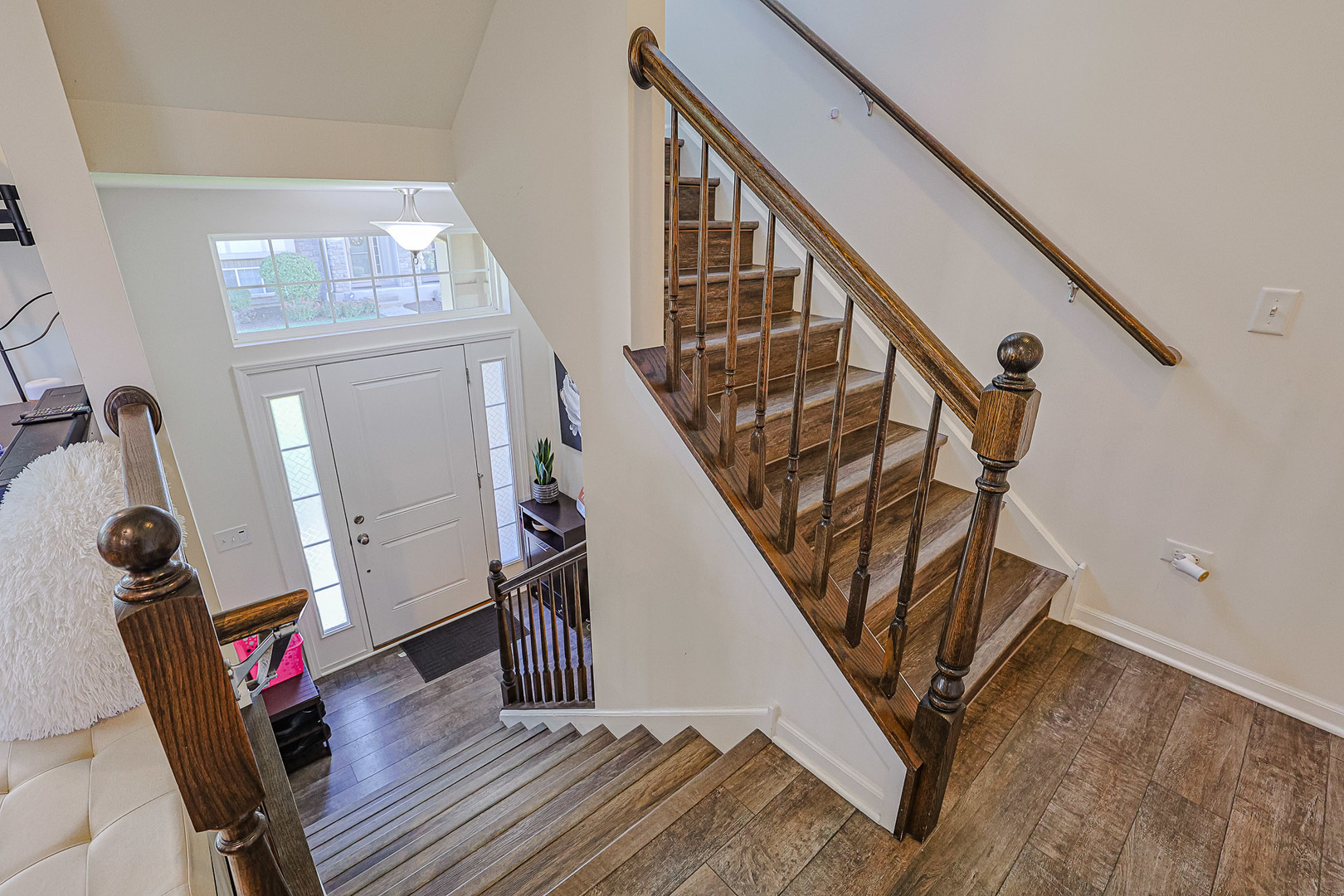 299 Bennett Drive Carol Stream, IL 60188 - Photo 21 of 27 a view of entryway and hall with wooden floor
