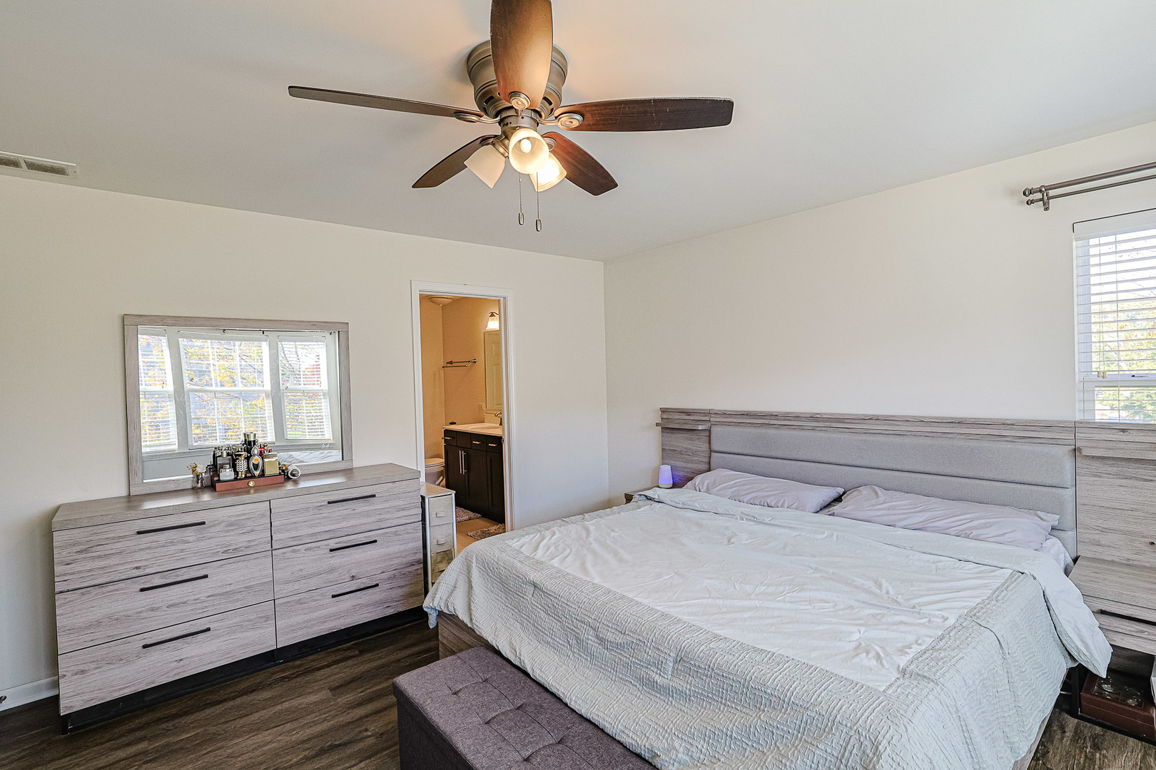 299 Bennett Drive Carol Stream, IL 60188 - Photo 22 of 27 a bedroom with a bed and wooden floor