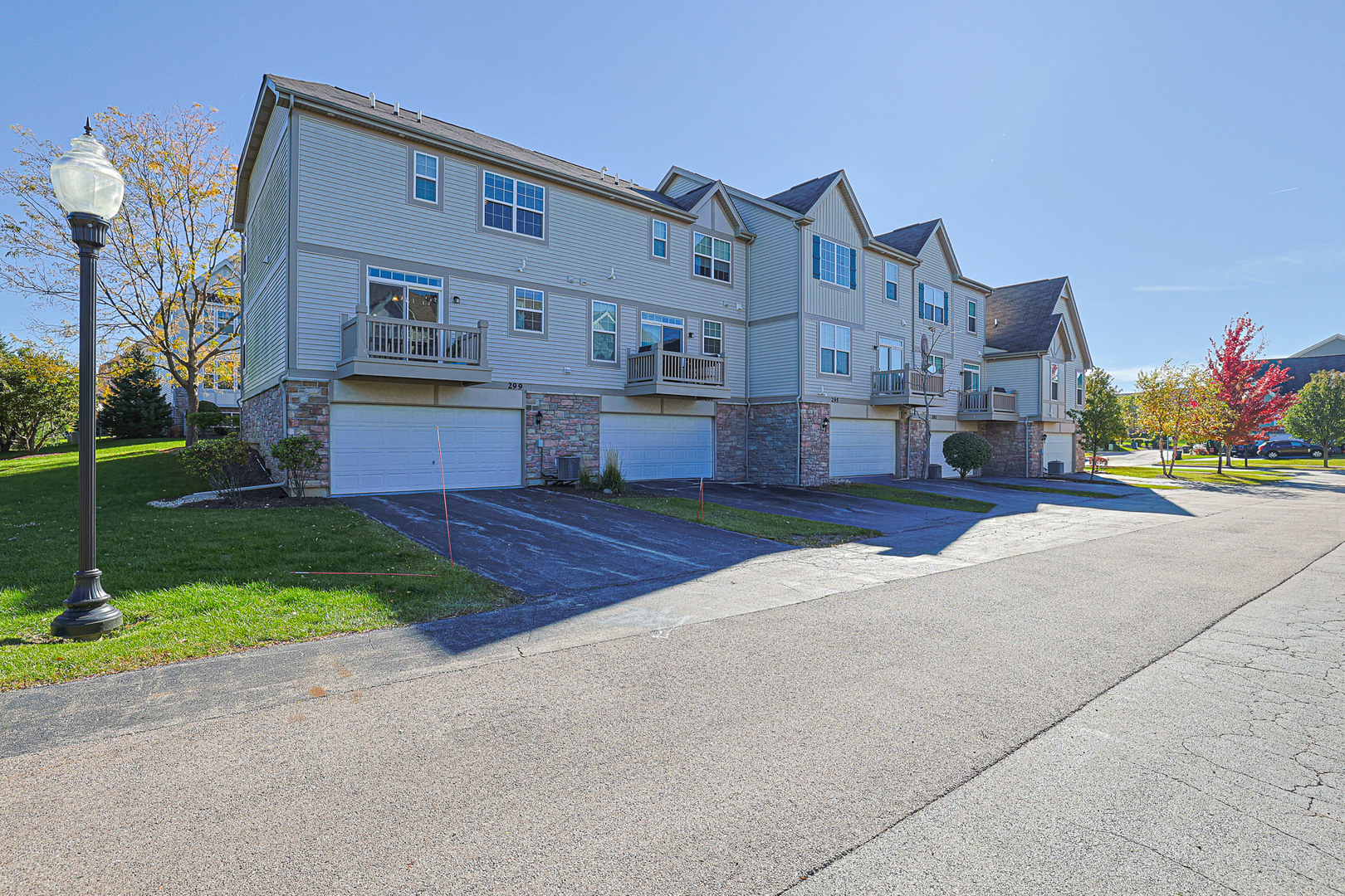 299 Bennett Drive Carol Stream, IL 60188 - Photo 26 of 27 a front view of house with yard and trees