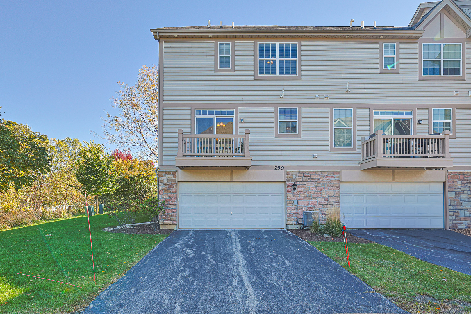 299 Bennett Drive Carol Stream, IL 60188 - Photo 27 of 27 a front view of a house with garden