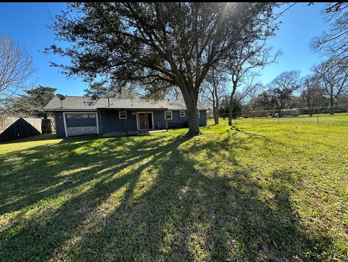 1902 Trinity League City, TX 77573 - Photo 4 of 11 a view of a house with a yard