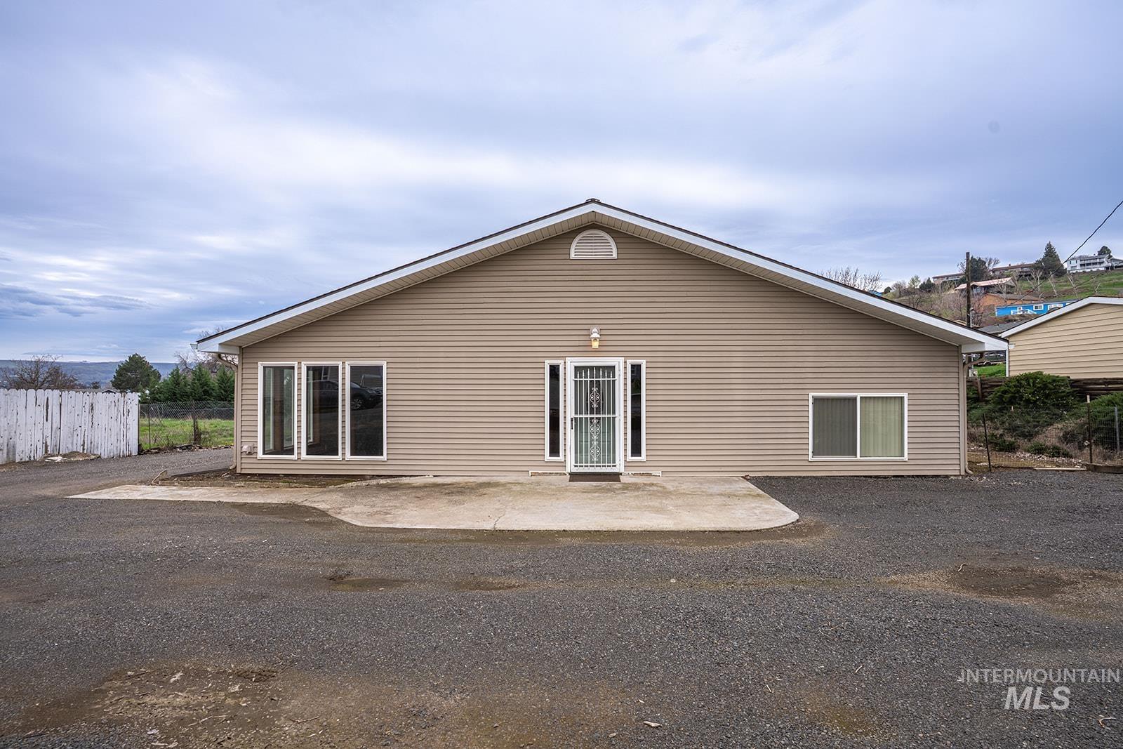 1357 Pound Lane Clarkston, WA 99403 - Photo 2 of 38 Rear view of house with a patio