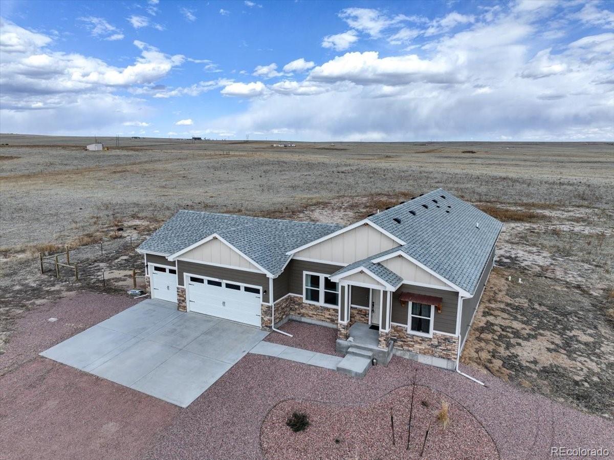 1215 North Yoder Road Yoder, CO 80864 - Photo 3 of 37 aerial view of house with ocean view