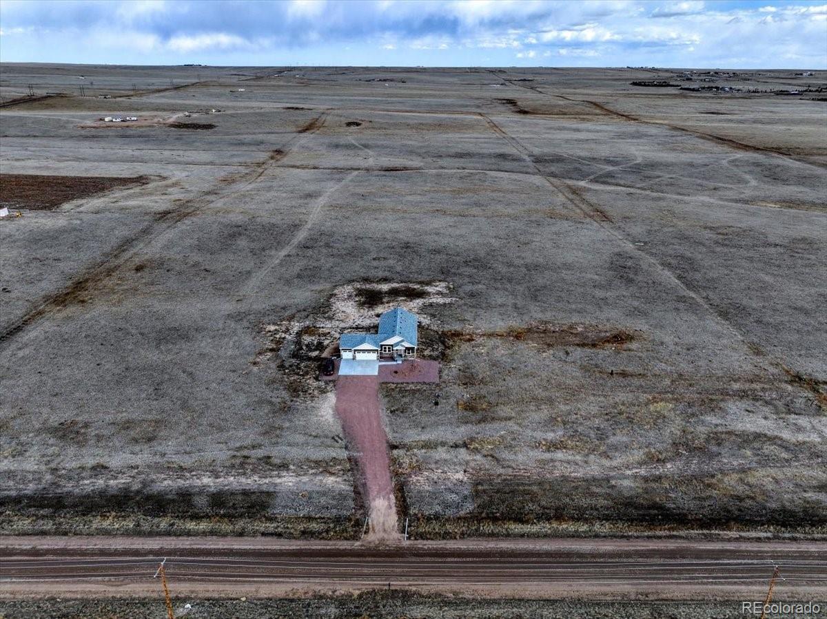 1215 North Yoder Road Yoder, CO 80864 - Photo 5 of 37 a view of entryway