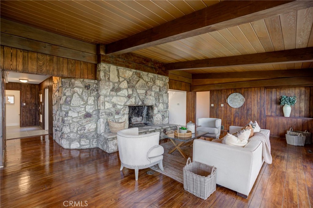 4612 Beauvais Road Rancho Palos Verdes, CA 90275 - Photo 13 of 40 a living room with furniture and a wooden floor