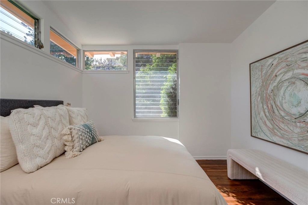 4612 Beauvais Road Rancho Palos Verdes, CA 90275 - Photo 27 of 40 a bedroom with a bed and a window