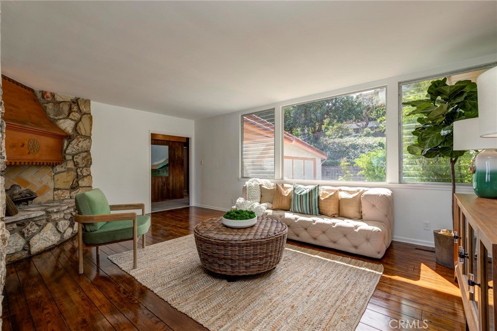 4612 Beauvais Road Rancho Palos Verdes, CA 90275 - Photo 6 of 40 a living room with furniture and a potted plant