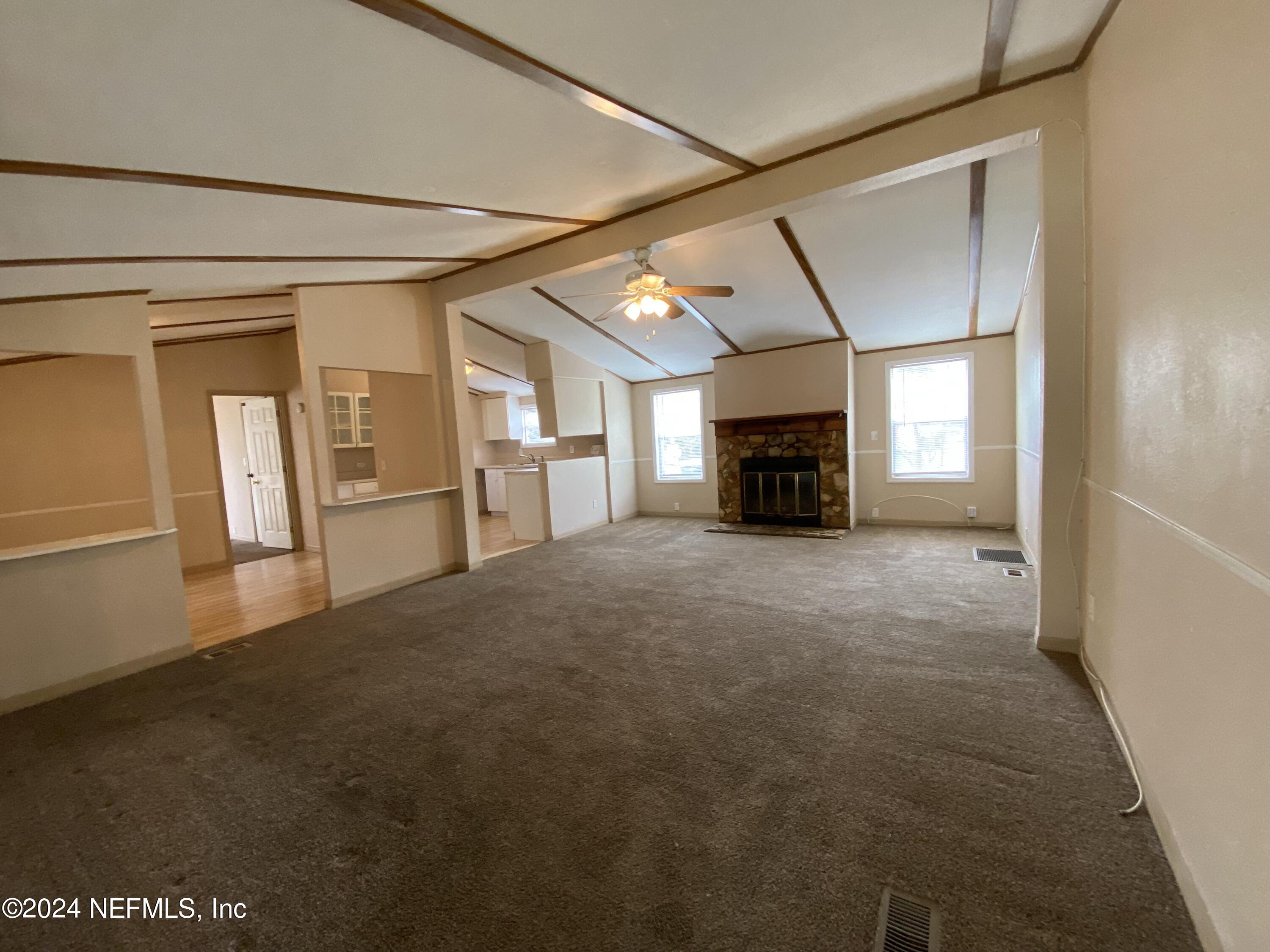 10356 Anson Road Jacksonville, FL 32246 - Photo 1 of 1 a view of a livingroom with a fireplace
