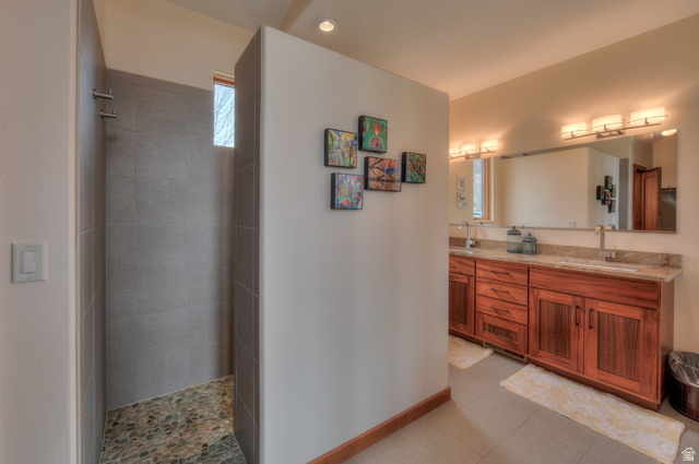 425 Amber Lane Moab, UT 84532 - Photo 11 of 27 Full bathroom with double vanity and walk in shower