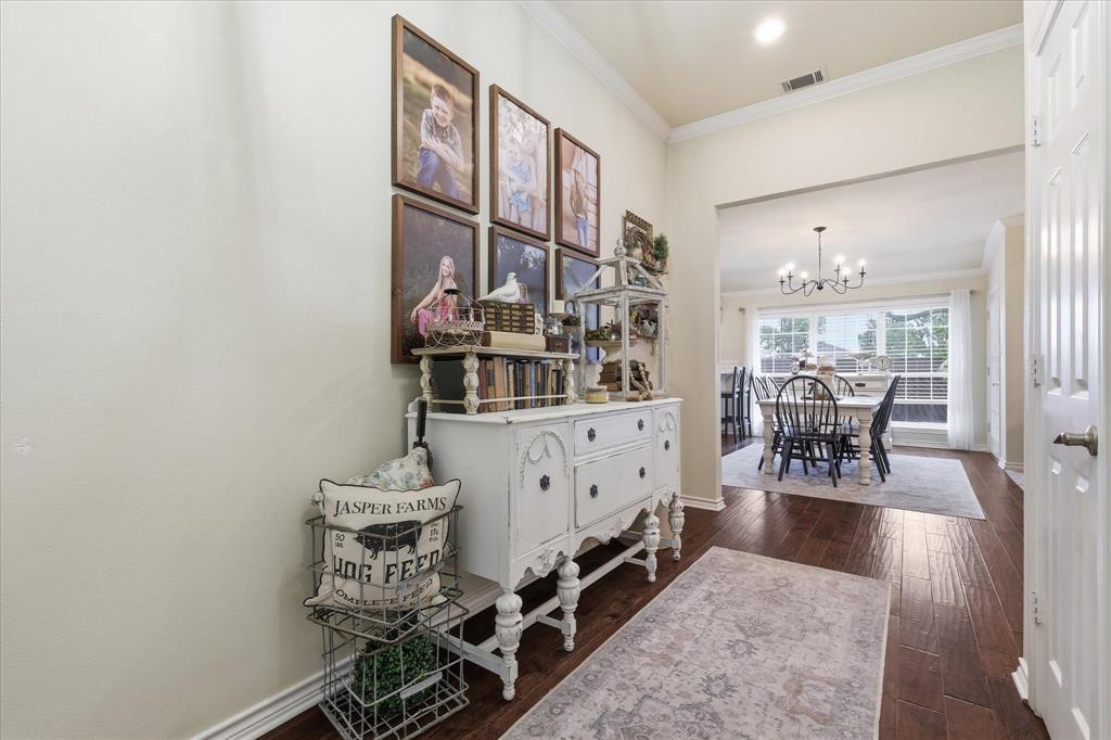 202 Colonial Heights Sanger, TX 76266 - Photo 5 of 27 a view of a room with gym equipment