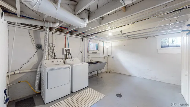a utility room with dryer and washer