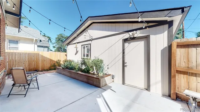 a view of a wrought iron fences in front of house