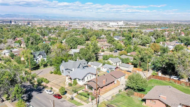 a picture of a room with a white wall and a picture