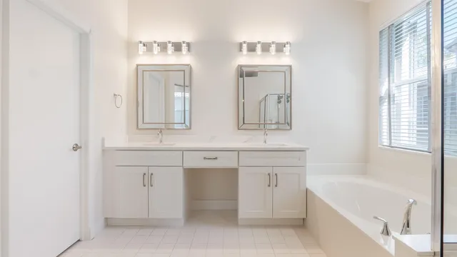 a bathroom with a toilet a sink and bathtub