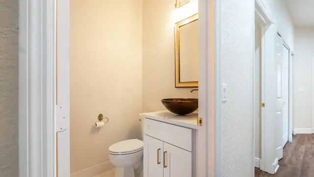 a bathroom with a toilet and a sink