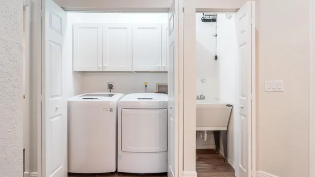 a utility room with dryer and washer