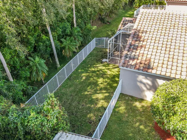 a view of balcony with yard
