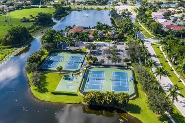 an aerial view of a house with outdoor space pool patio and outdoor seating