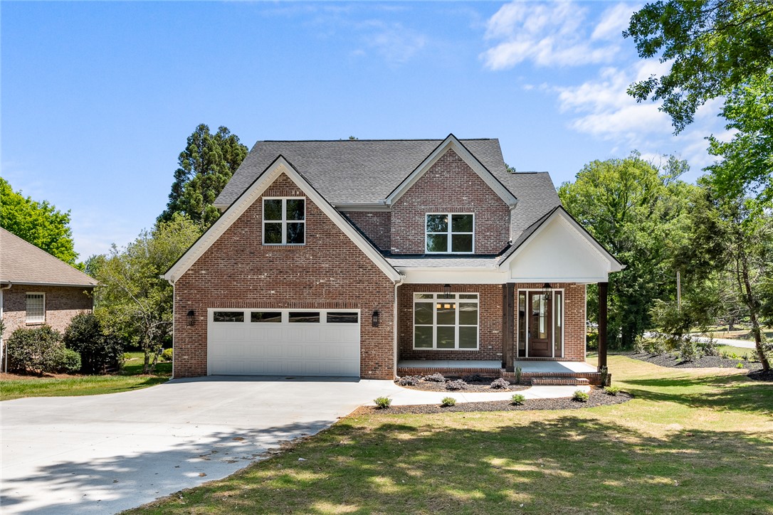 100 Garden Gate Drive Anderson, SC 29621 - Photo 1 of 43 This classic brick residence presents a welcoming facade with traditional architecture and a spacious driveway.