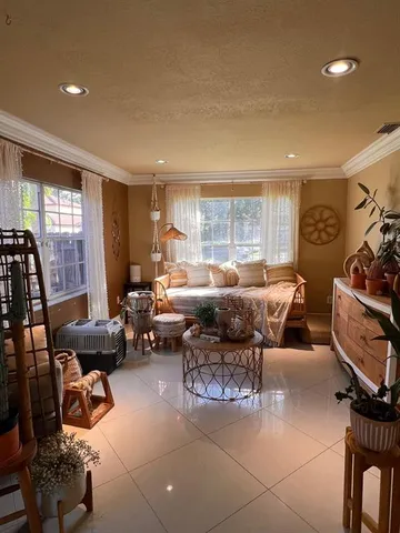 a view of the patio with dining table and chairs