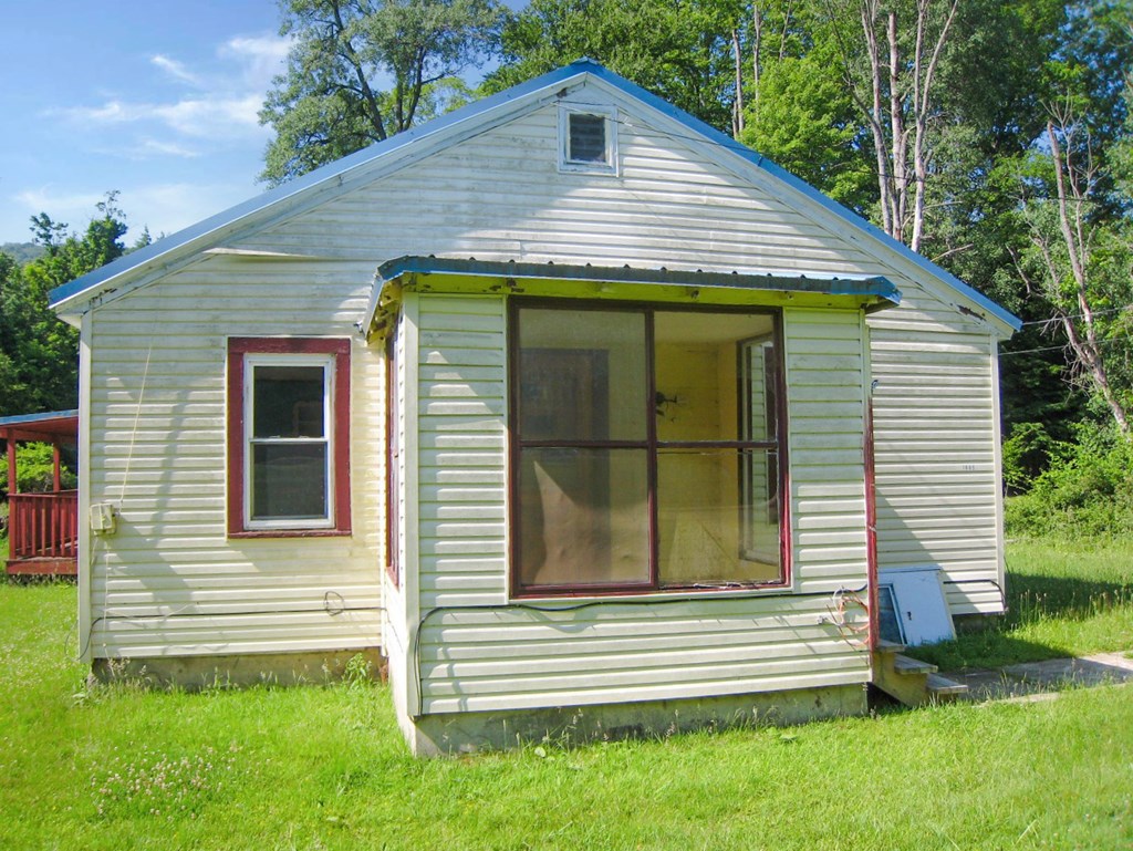 1665 Jackson Run Road Warren, PA 16365 - Photo 3 of 15 a front view of a house with a yard