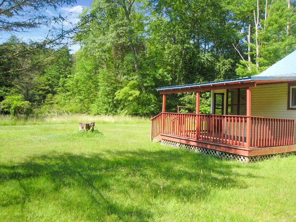 1665 Jackson Run Road Warren, PA 16365 - Photo 7 of 15 a view of a deck with a small yard