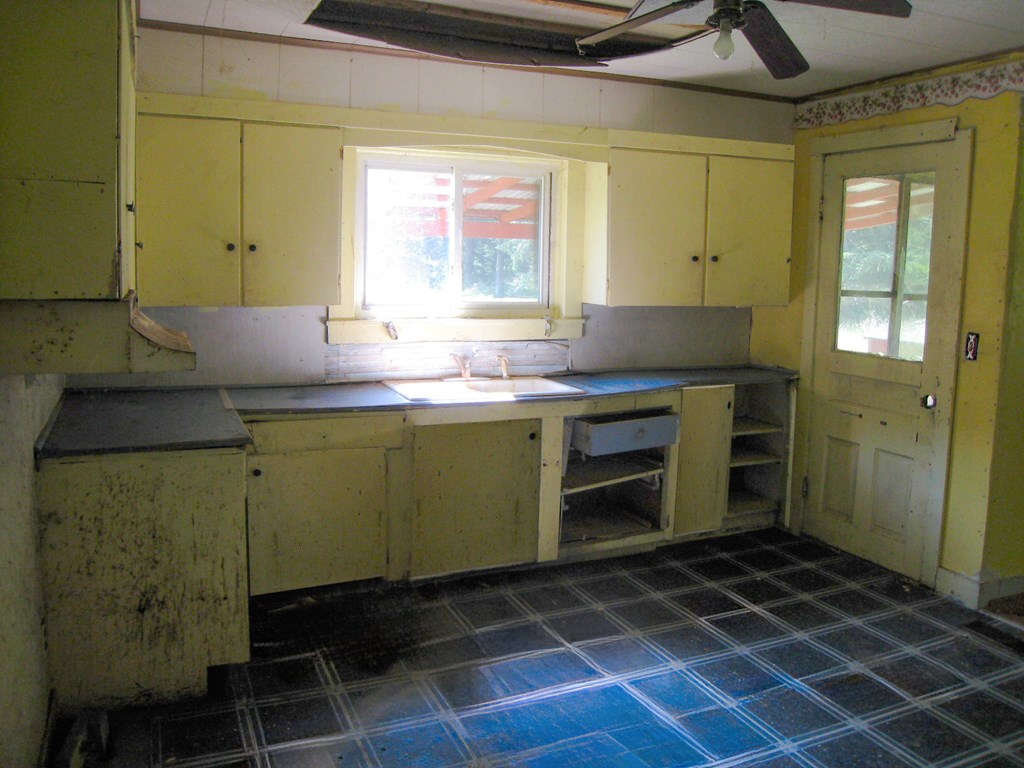 1665 Jackson Run Road Warren, PA 16365 - Photo 10 of 15 a room with a sink and a mirror