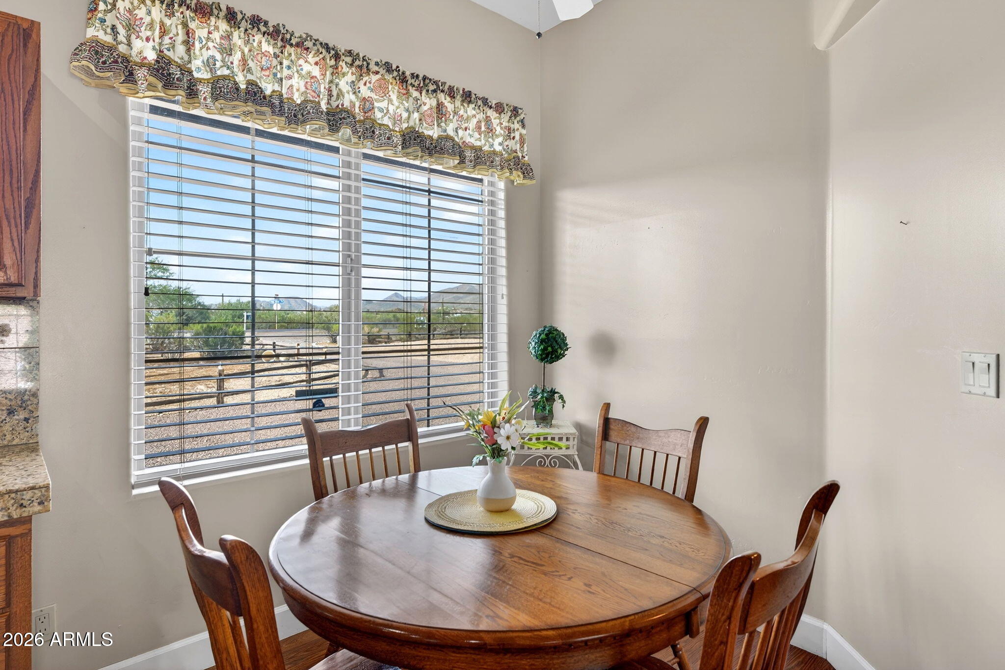 2929 West New River Road New River, AZ 85087 - Photo 14 of 53 a view of a dining room with furniture and wooden floor