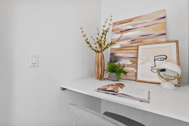 an empty room with wooden floor