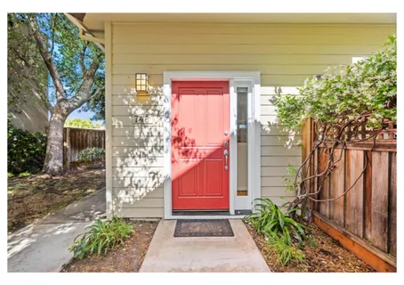 a view of chair and tables in the balcony