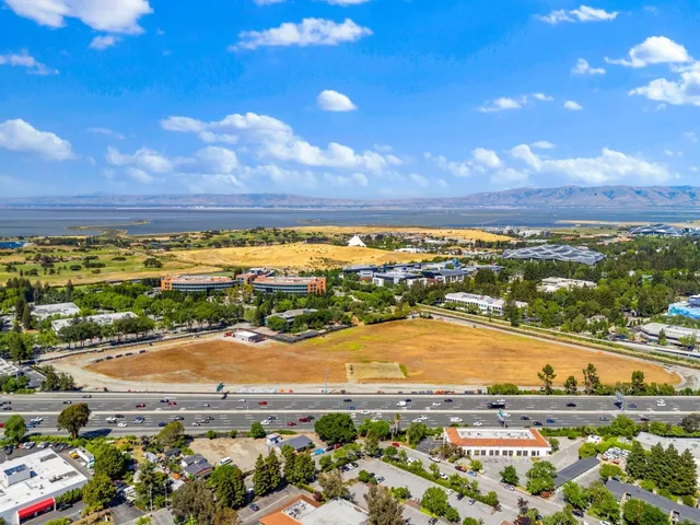 a view of a city with an ocean