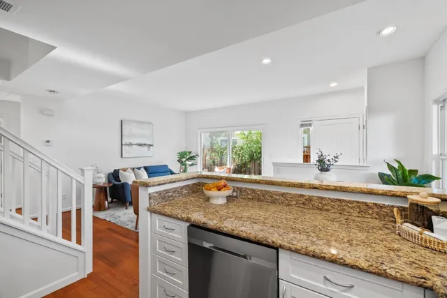 a view of living room with furniture and a table