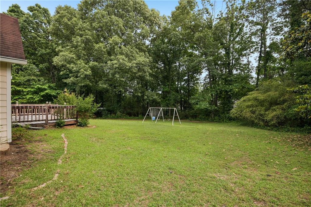 1318 Panhandle Way Hampton, GA 30228 - Photo 19 of 22 a view of a golf course with a house