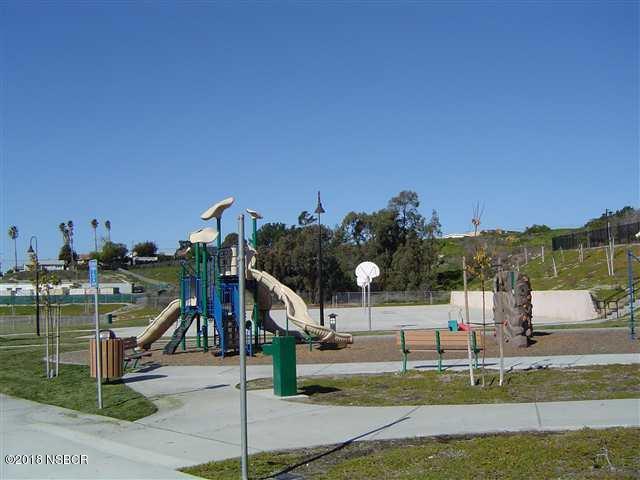 513 Andromeda Drive Lompoc, CA 93436 - Photo 13 of 15 a view of a park with large trees