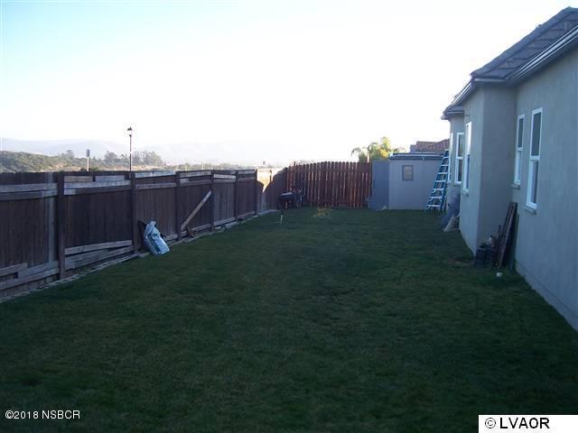 513 Andromeda Drive Lompoc, CA 93436 - Photo 6 of 15 a view of a backyard