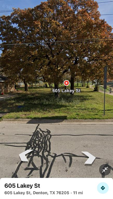 605 Lakey Street Denton, TX 76205 - Photo 2 of 4 a black and white photo of a lake