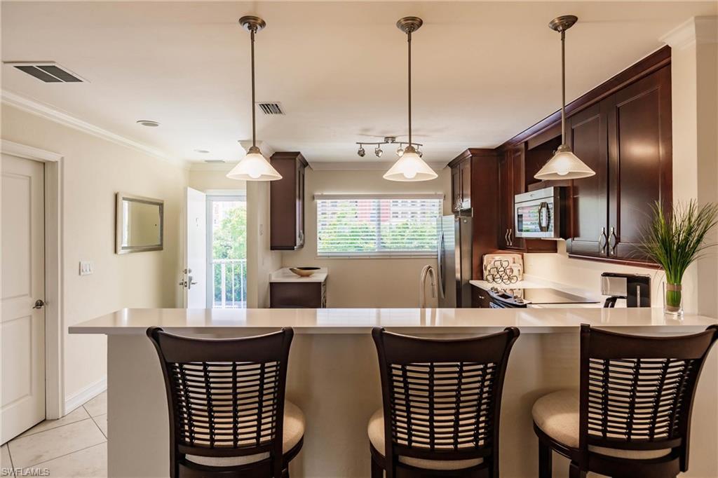 307 Goodlette-Frank Road, Unit 503B Naples, FL 34102 - Photo 8 of 24 View into kitchen