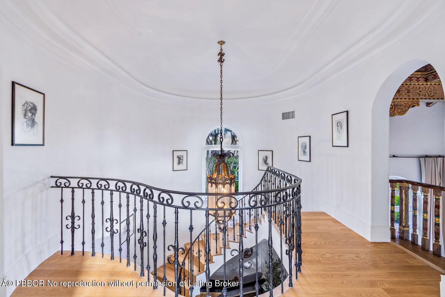 111 Via Del Lago Palm Beach, FL 33480 - Photo 39 of 72 a view of entryway with a hall and wooden floor